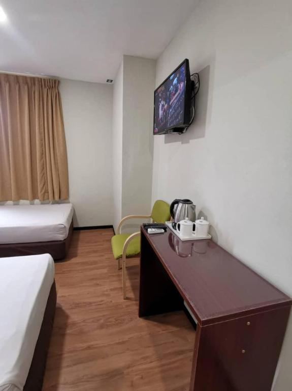 Hotel Holiday Kota Kinabalu Buitenkant foto